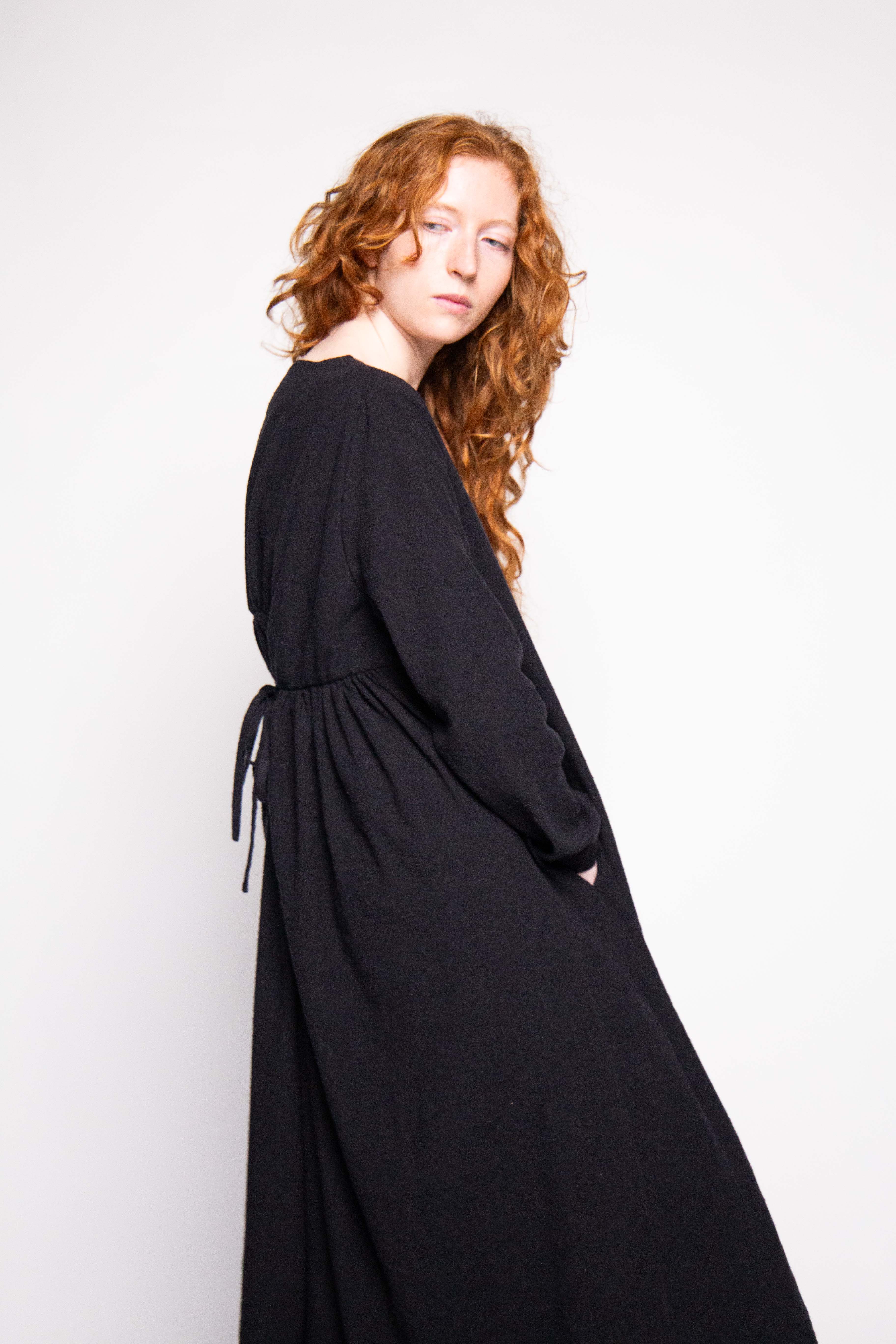 Emma dress, full-length side view on model